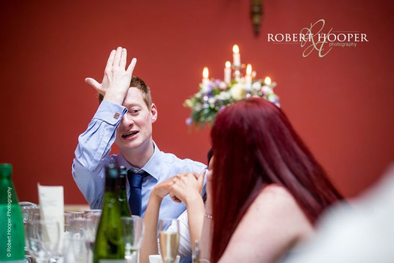 Wedding guests seated for wedding breakfast at Hampton Court House Surrey