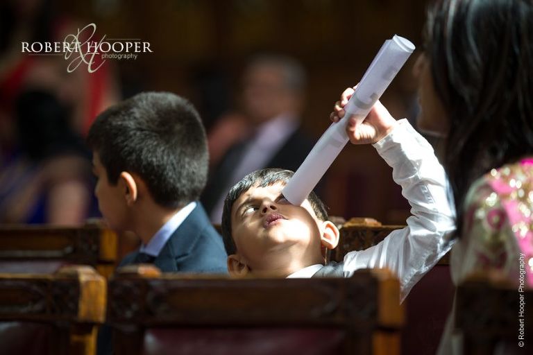 Young wedding guest at Hindu wedding ceremony