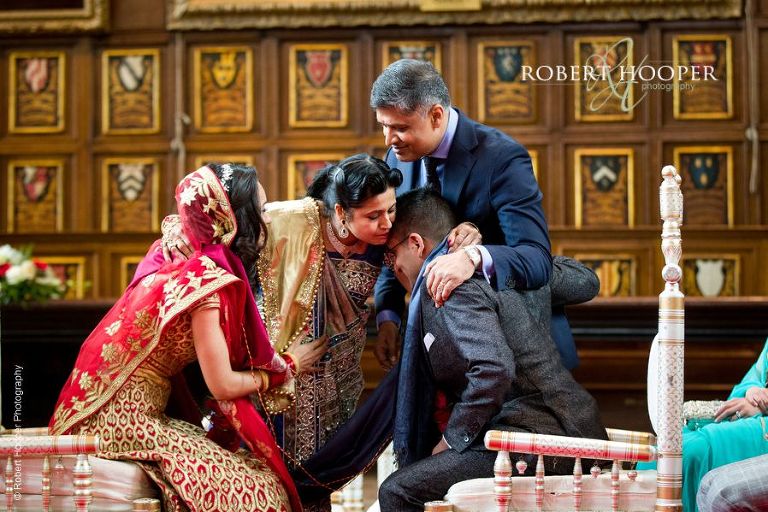 Granthi Bandhan, Varmala (tying of the nuptual knot) at Hindu wedding ceremony London