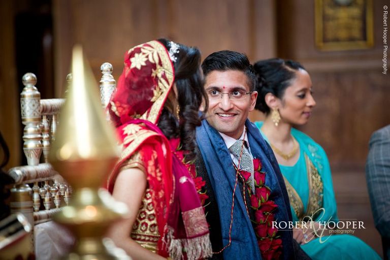Granthi Bandhan, Varmala (tying of the nuptual knot) at Hindu wedding ceremony London