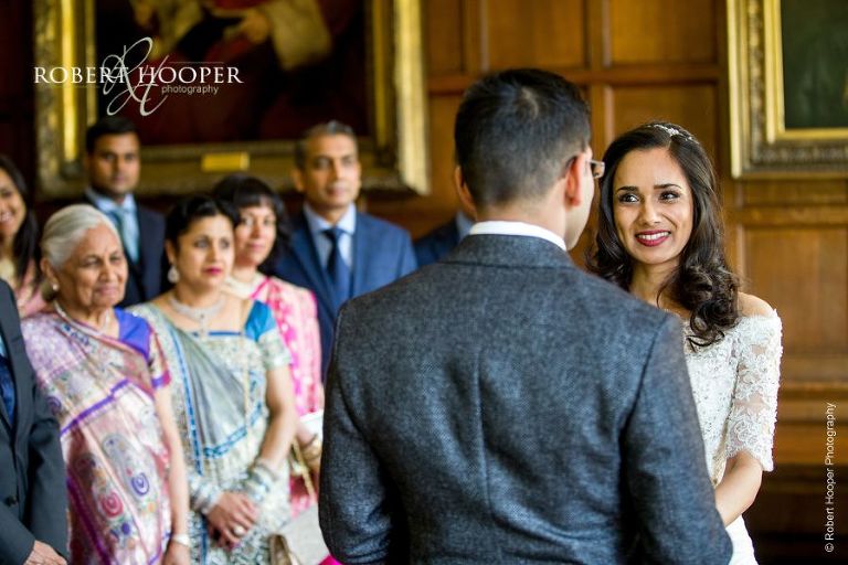 Bride and groom say their vows during legal wedding ceremony at Middle Temple London