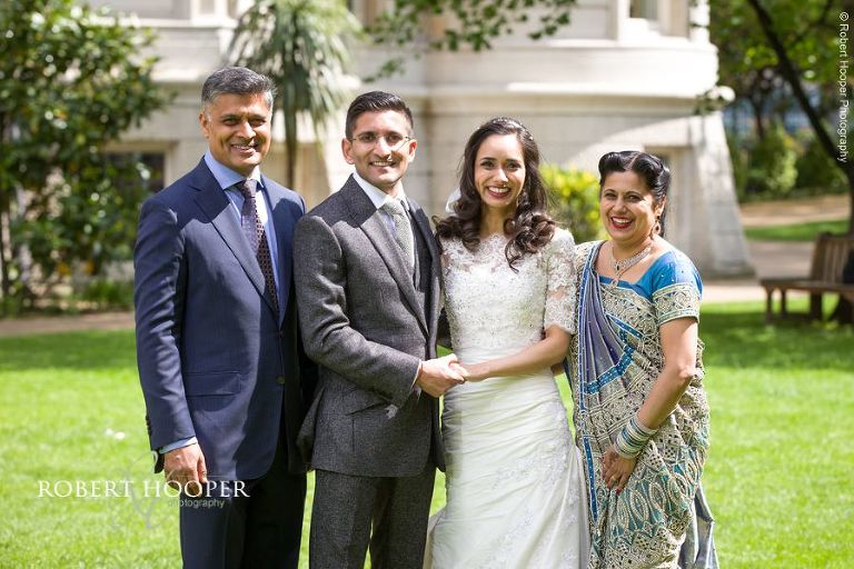 Bride and groom formal photography with parents after legal ceremony at Middle Temple London