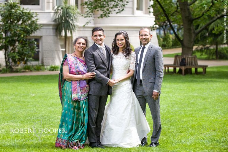 Bride and groom formal photography with parents after legal ceremony at Middle Temple London