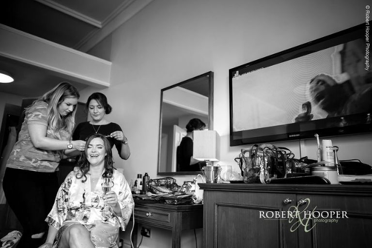 Bride having hair done for wedding at Wotton House Dorking Surrey