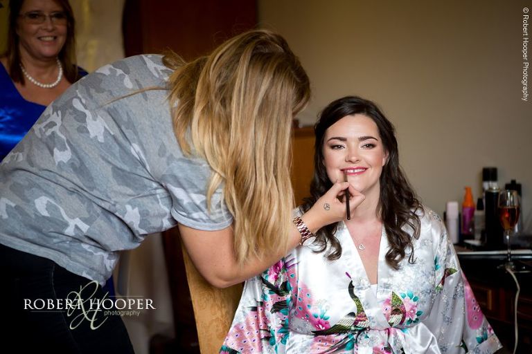 Bridal preps for wedding ceremony at Wotton House Dorking Surrey