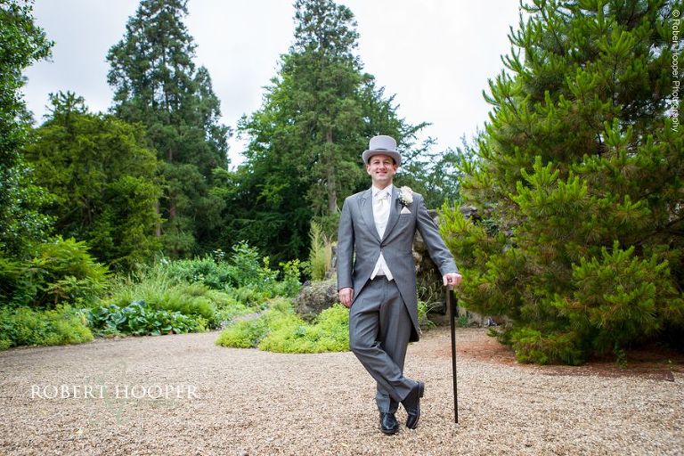 Groom in top hat and tails for wedding day at Wotton House Dorking Surrey