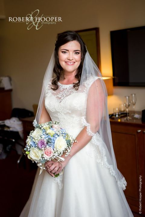 Bridal portrait taken just before she leaves for wedding ceremony at Wotton House Dorking Surrey