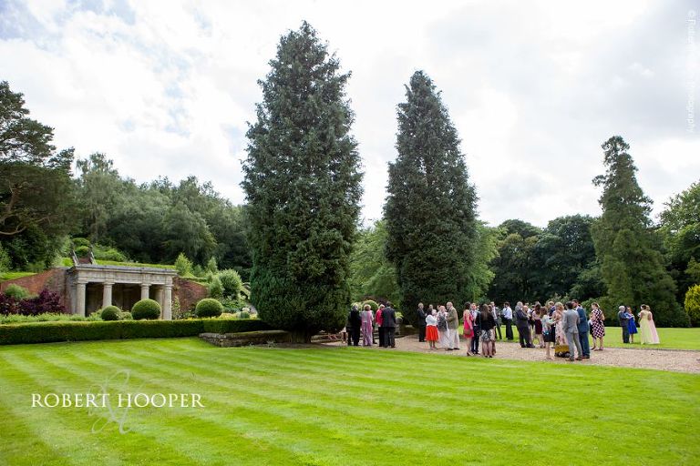 Wedding guests in gardens at Wotton House Dorking Surrey