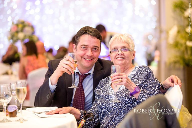 Wedding guests seated for wedding breakfast at Wotton House Dorking Surrey