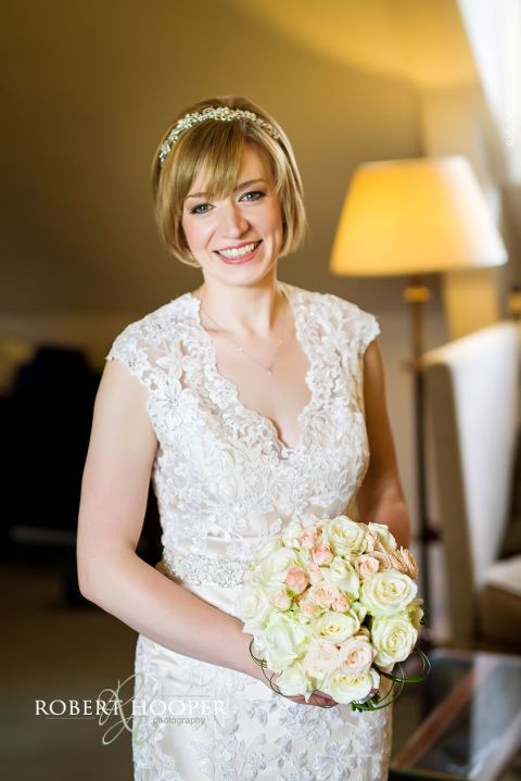 Bride ready to leave for ceremony on wedding day at Chilston Park Hotel Maidstone Kent