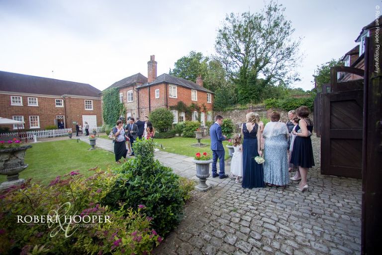 Wedding guests move to evening venue for band on wedding day at Chilston Park Hotel Maidstone Kent