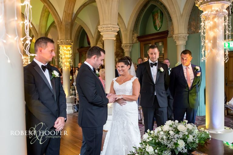 Bride and groom during wedding ceremony at Wotton House Dorking Surrey