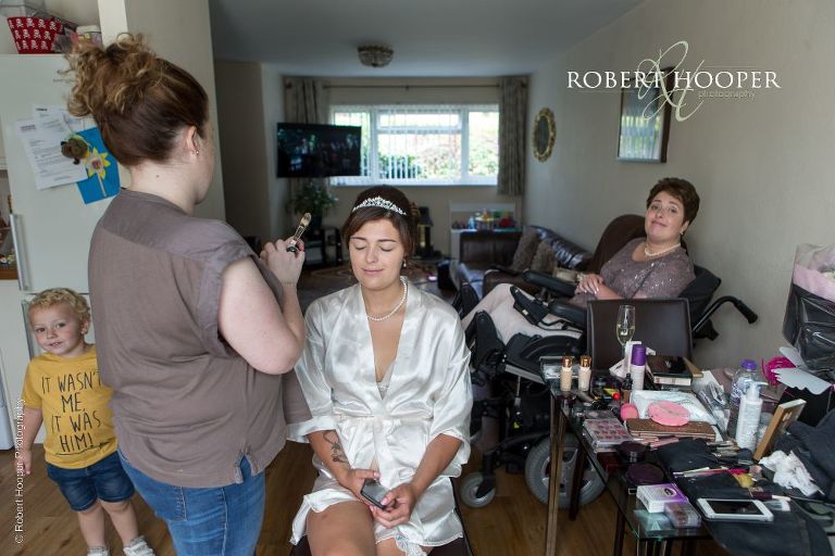 Bridal preps for wedding day at Oaks Farm Surrey