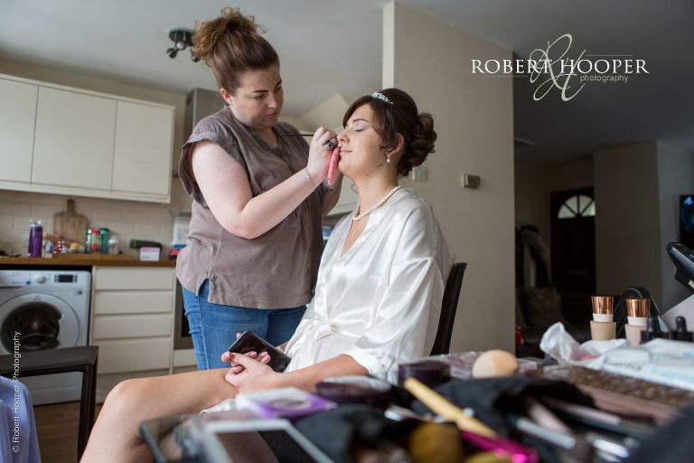 Bridal preps for wedding day at Oaks Farm Surrey