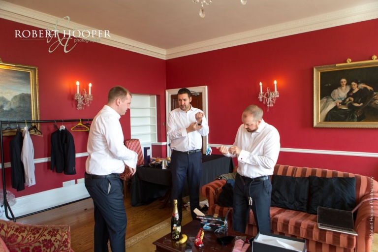 Groom preps for wedding at Addington Palace