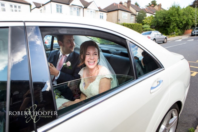 Bride in wedding car