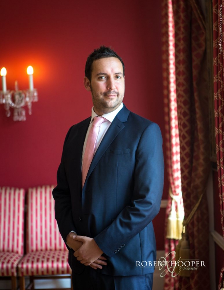 Groom preps for wedding at Addington Palace