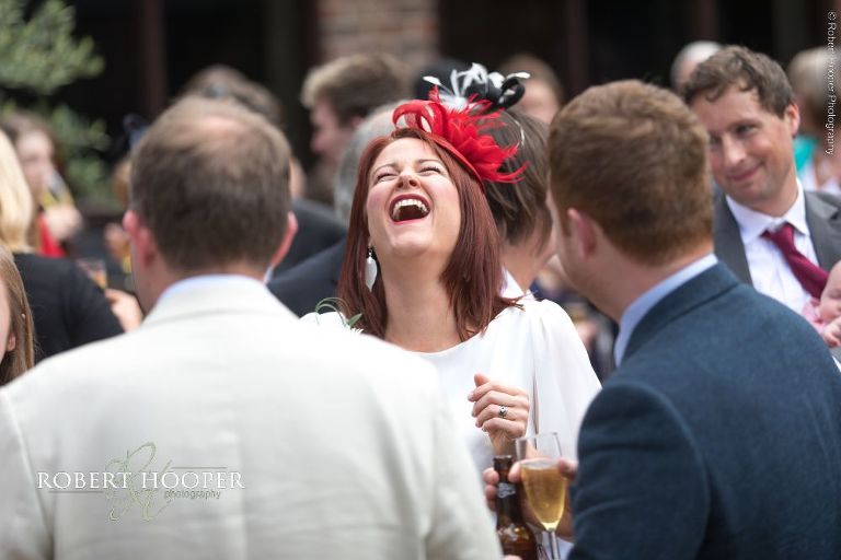 Wedding guest laughing
