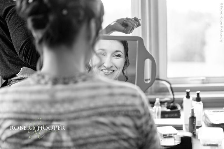 Bridal having make up on wedding day