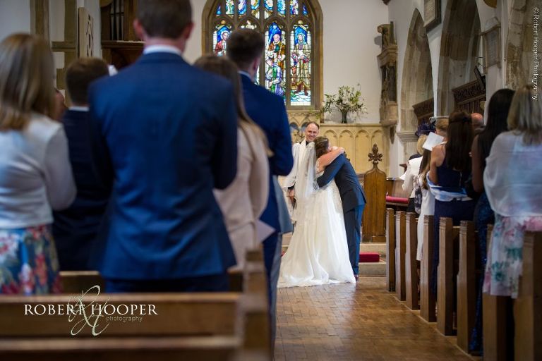bride and groom in church