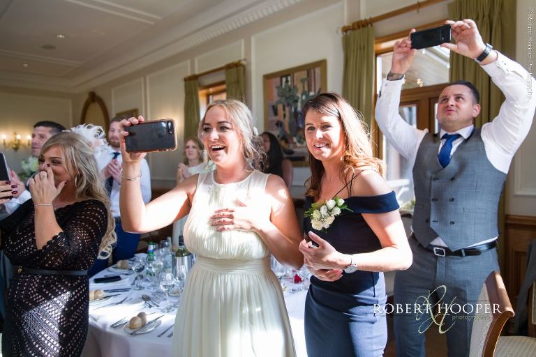 wedding guests taking photographs