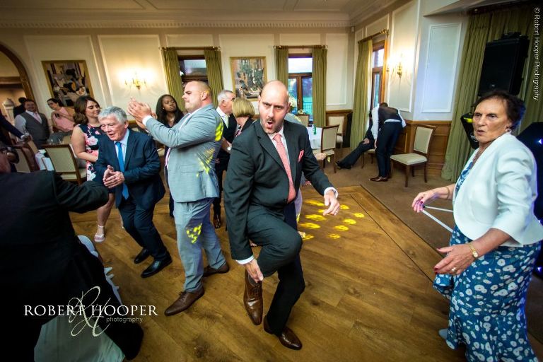guest dancing at London golf Club wedding