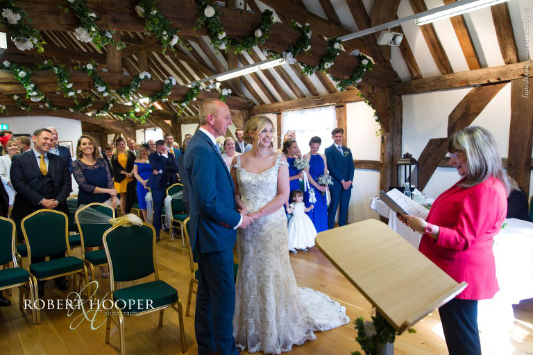 bride and groom exchanging vows