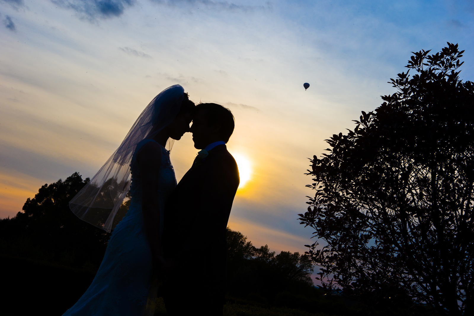 Wedding couple at sunset on wedding day at Cain Manor Surrey