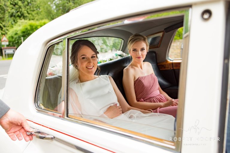 bride in wedding car