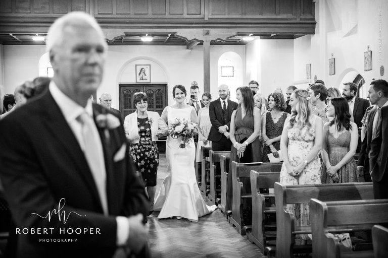 bride walks down the aisle