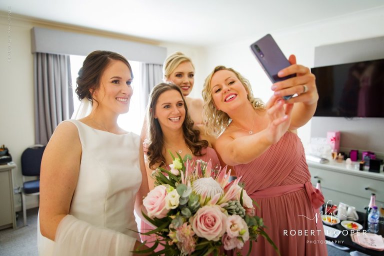 bride and bridesmaids selfie