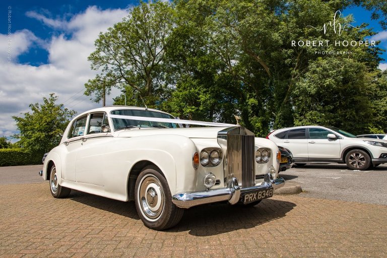 White Rolls Royce wedding car